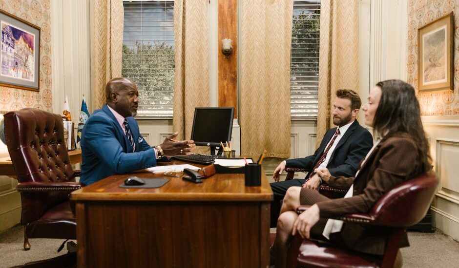 Attorney meeting with a client in a law office